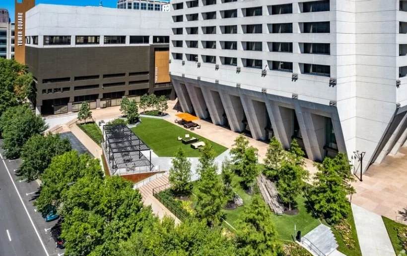 HGOR led the landscape architecture design for 675 West Peachtree, reimagining a 40,000-square-foot plaza at the base of a legacy Midtown tower into a vibrant, multi-functional urban destination. Originally defined by harsh hardscape and limited usability, the space remained underutilized for more than three decades. The redesign transforms the plaza into a transit-oriented environment that supports retail, dining, events, and everyday workplace activity, creating a new value proposition for both the public realm and the 1.4 million-square-foot office complex it serves.