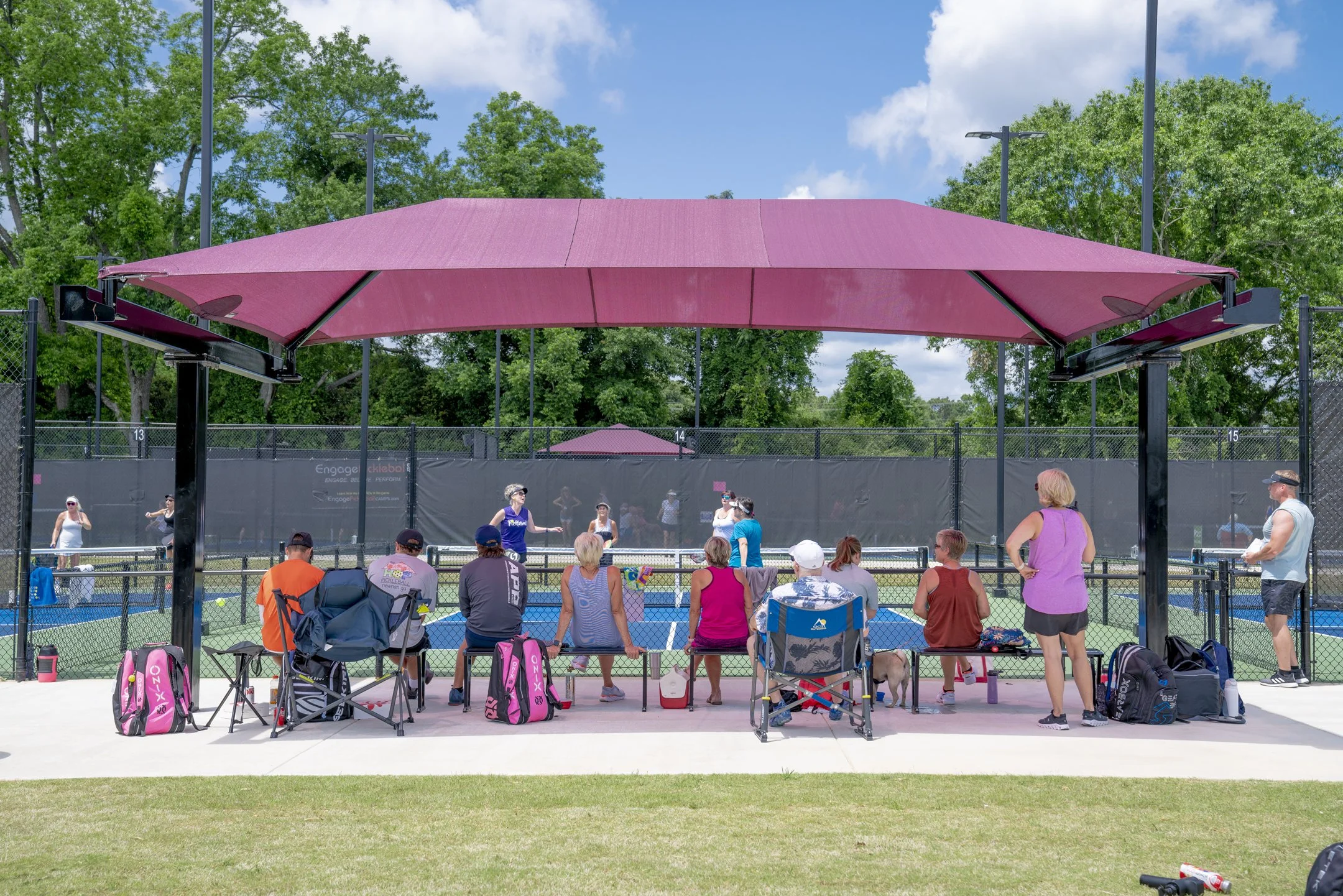 House of Pickleball, Newnan, GA – Underneath a courtside shade structure, players of all ages are now enjoying the nation’s fastest-growing sport in the city of Newnan.