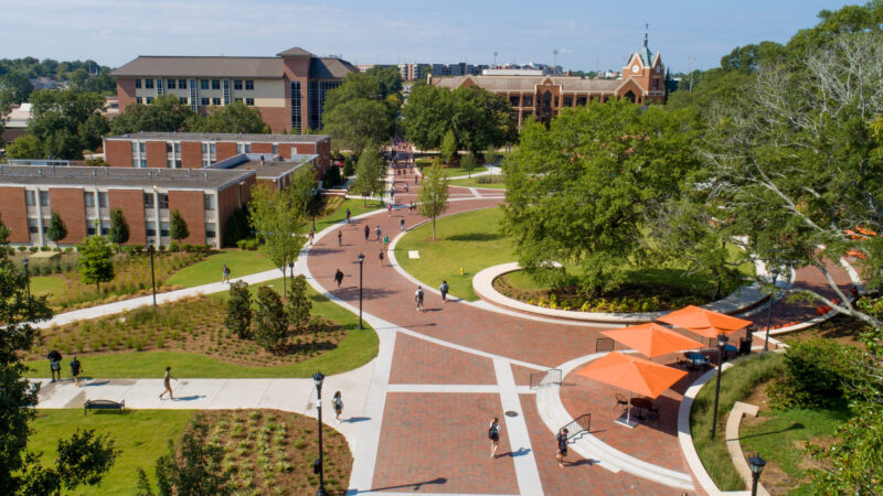 College Street Transformation at Mercer University students walking on paths throughout green space