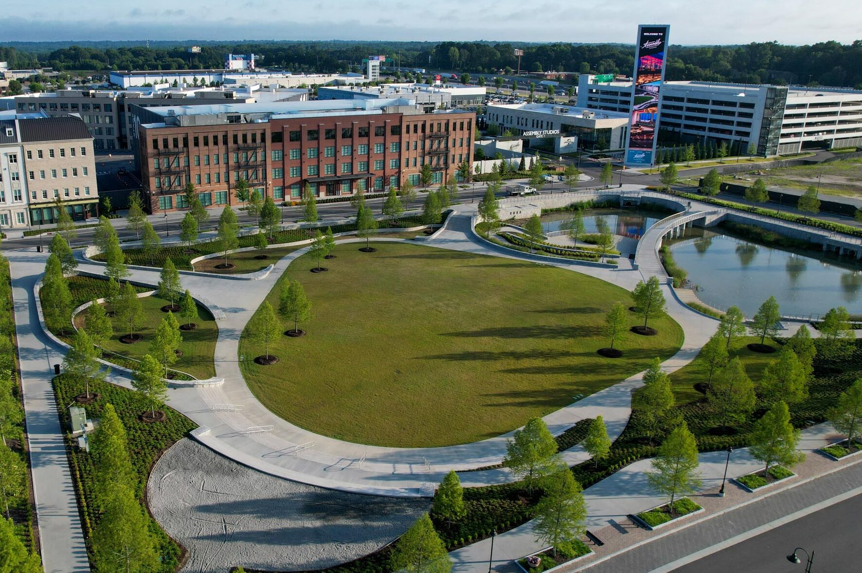 The Assembly Atlanta green space with pond and walking paths