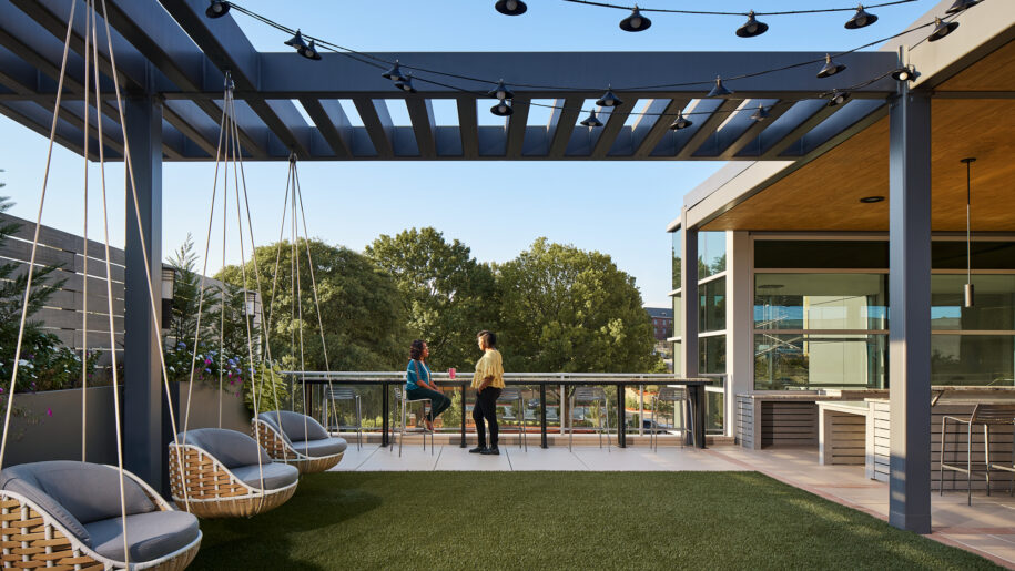 patio courtyard with pergola and lights overhead at Roosevelt Hall