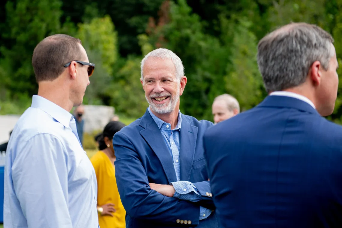 men in suits talking