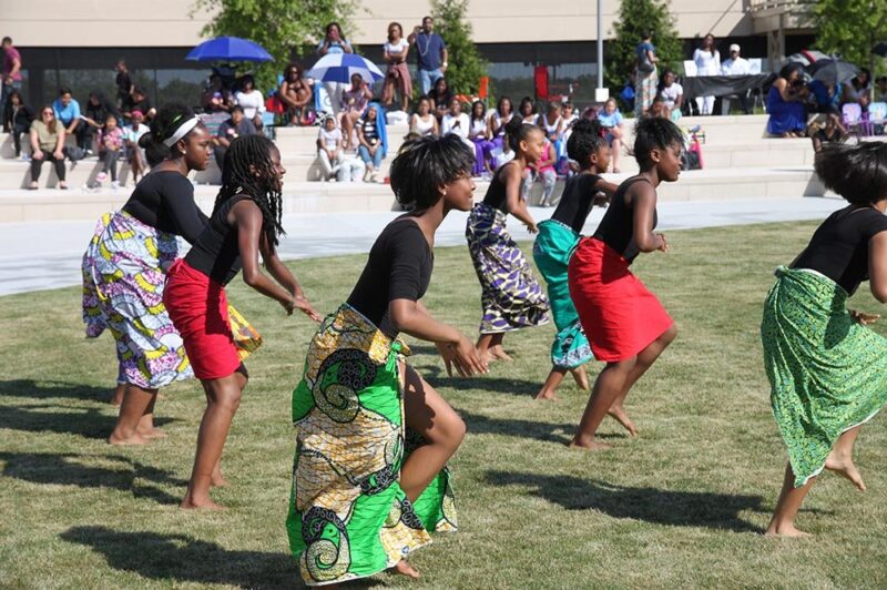 Liberty plaza area with kids dancing