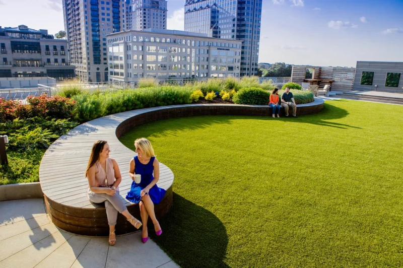 Spanx Headquarters people relaxing in green space garden