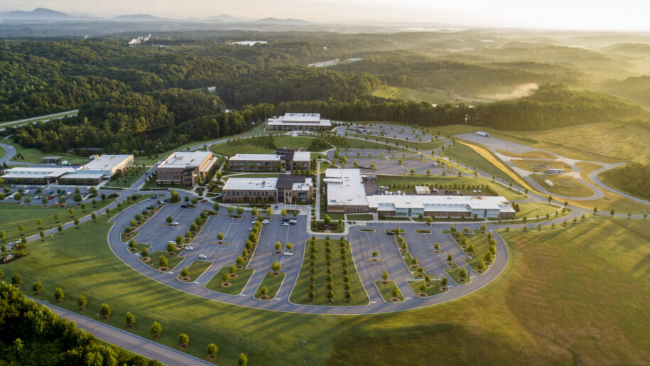 Lanier Technical College aerial view with view of forest and mountains in background