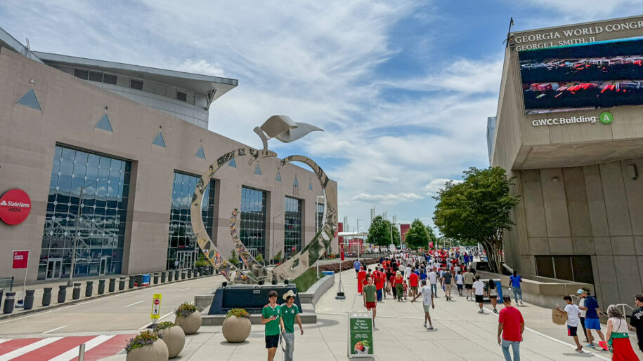 people walking down a corridor near GWCC